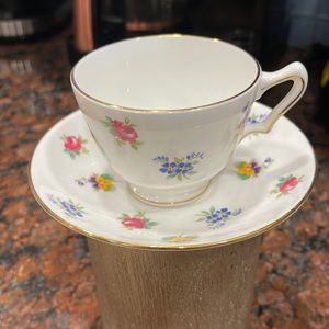 Crown Staffordshire tea cup and saucer forget me knots violets roses gold